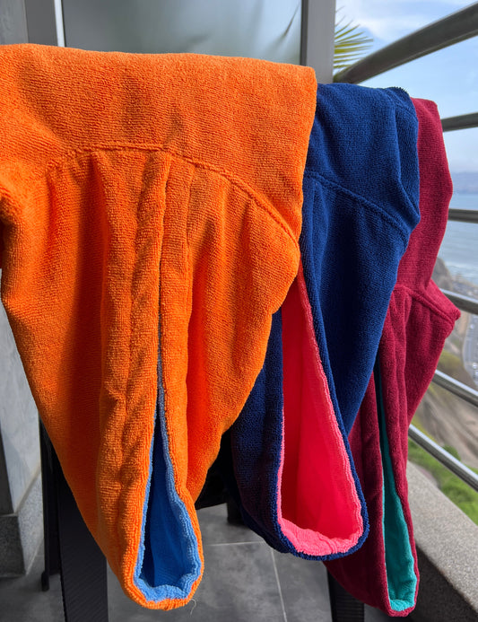 Poncho Camden Niños Anaranjado - Celeste